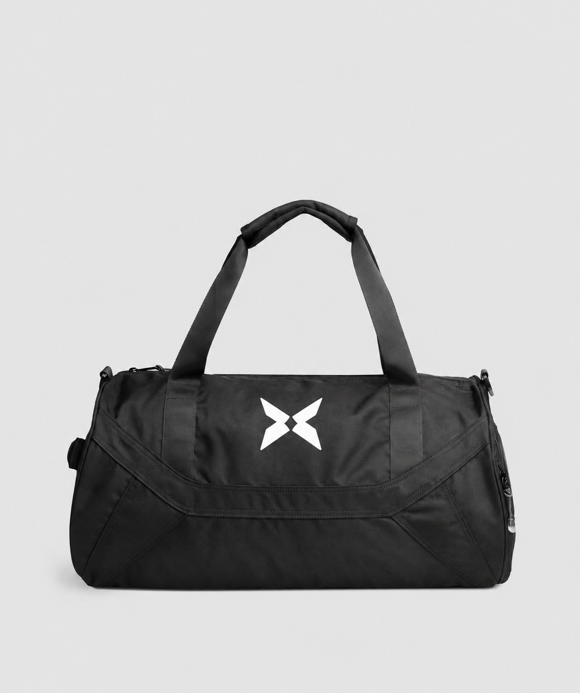 Black BRAVO duffel bag with white X logo on a plain studio background